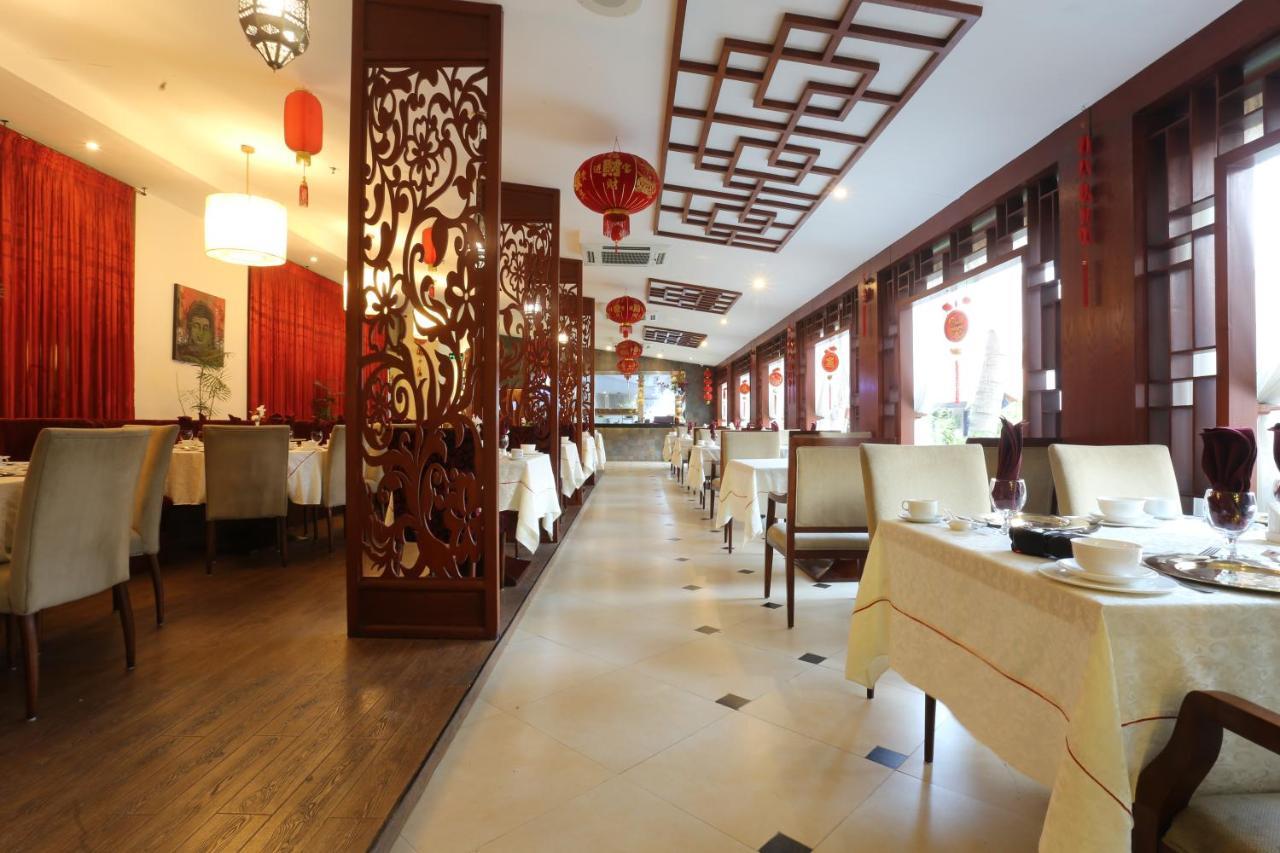 Ramada Plaza By Wyndham Karachi Airport Hotel מראה חיצוני תמונה Interior of a restaurant in Beijing