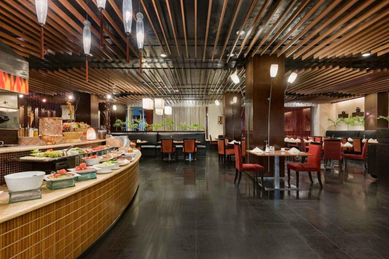 Ramada Plaza By Wyndham Karachi Airport Hotel מראה חיצוני תמונה The restaurant